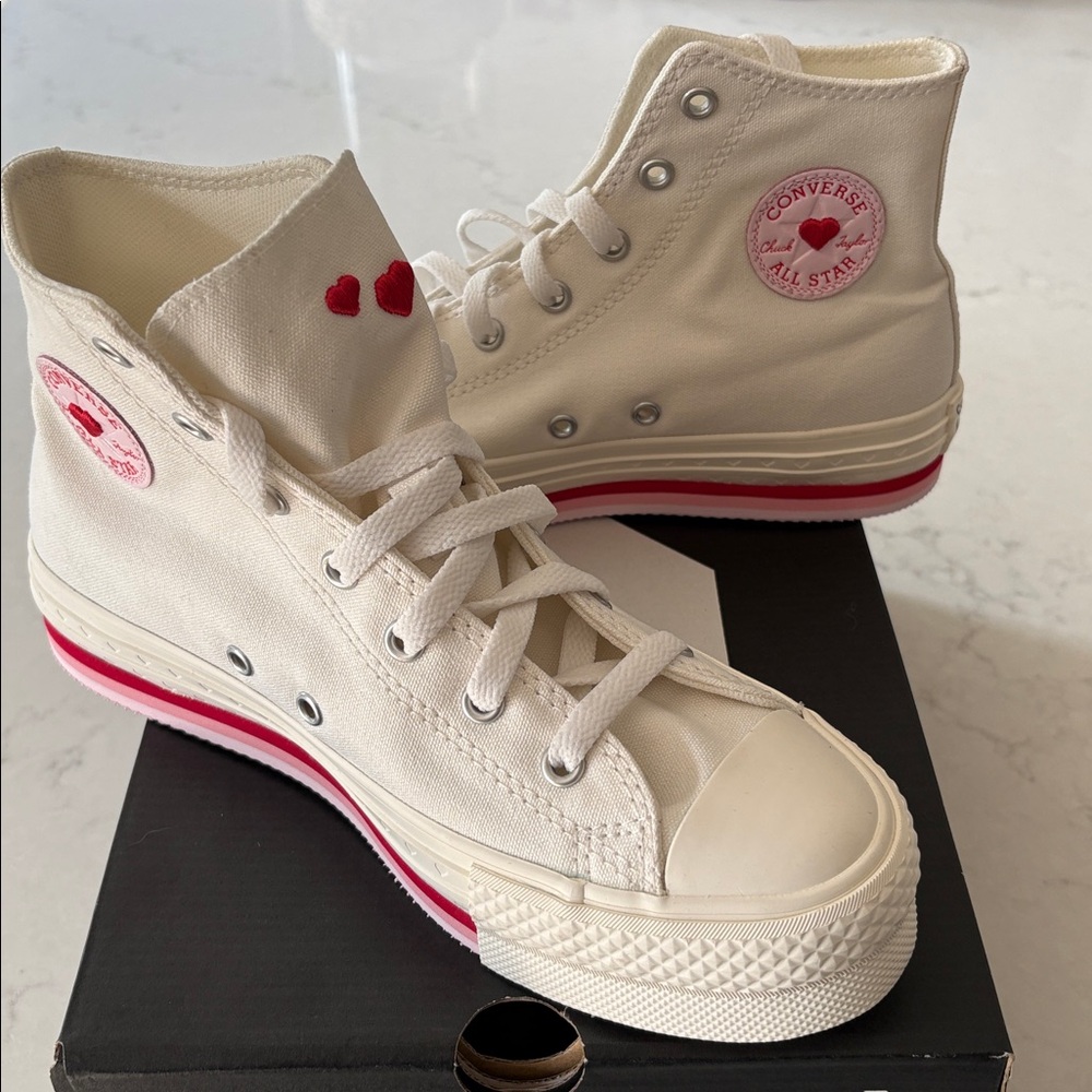 Converse Cream High-Top Sneakers with Pink and Red Accents